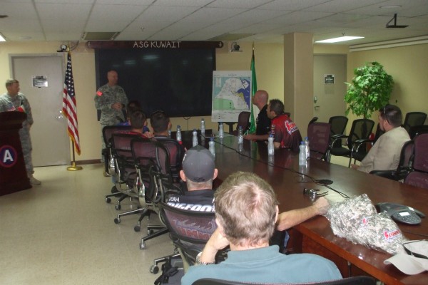 nhra drivers getting a military briefing during overseas visit