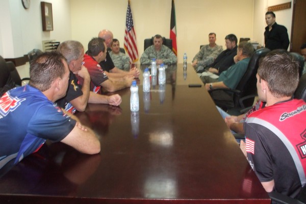 nhra drivers getting a military briefing during overseas visit