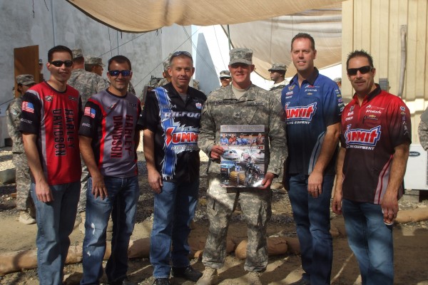 nhra drivers pose for picture with military troops stationed overseas