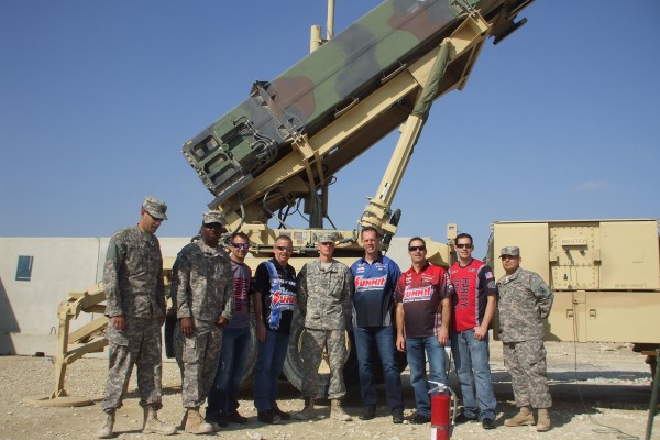 nhra drivers pose for photos with military troops stationed overseas