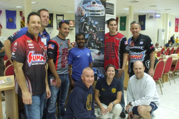 nhra drivers pose for pictures with military troops stationed overseas