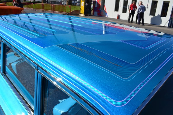 custom candy metal flake paint job on the roof of a hot rod lowrider