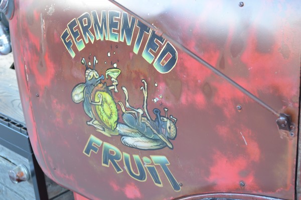 fermented fruit custom paint on the side of a rat rod