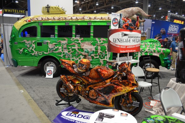 school bus and motorcycle displayed at SEMA 2013