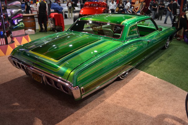 late 1960s chevy impala lowrider coupe displayed at SEMA 2013