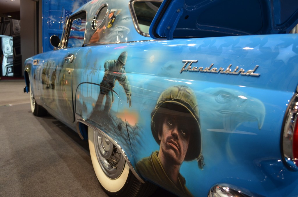 military themed American mural on vintage Ford Thunderbird coupe