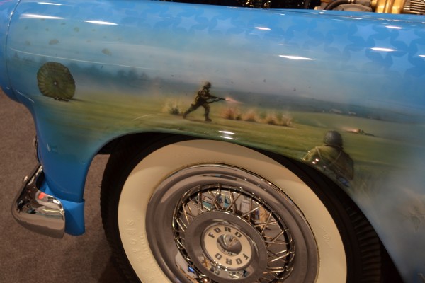 military themed American mural on vintage Ford Thunderbird coupe