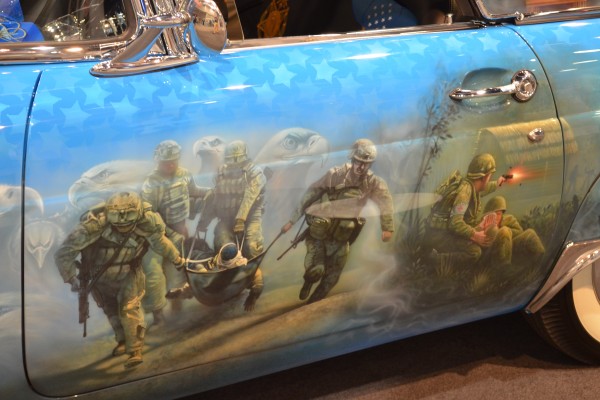 military themed American mural on vintage Ford Thunderbird coupe