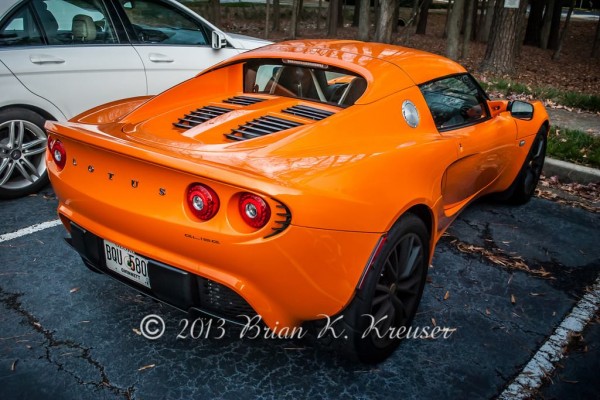 rear view of an orange lotus elise