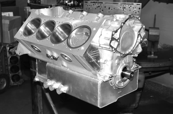ford performance race engine partially assembled on stand