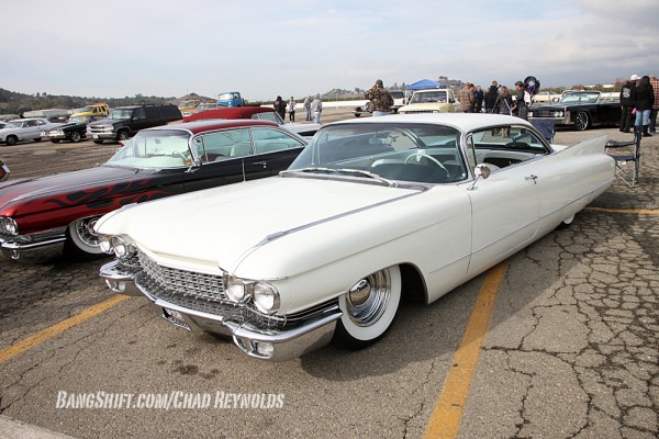 lowered custom Cadillac coupe at car show