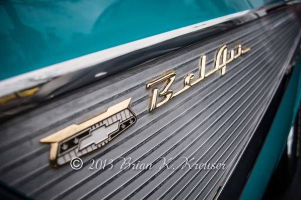 close up of Bel Air script emblem on the tail fin of a 1957 Chevy