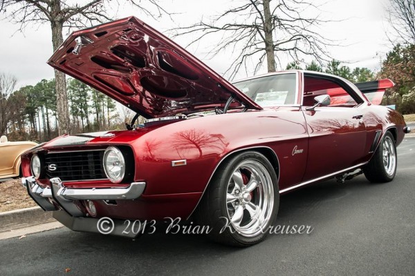 red 1969 chevy camaro ss with custom wheels