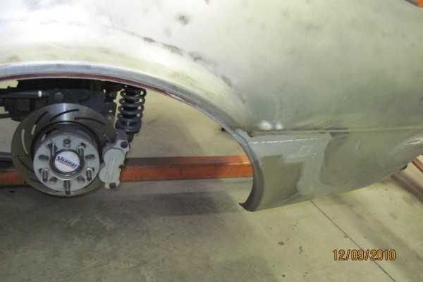 repaired fender on a 1967 chevy camaro in bare steel