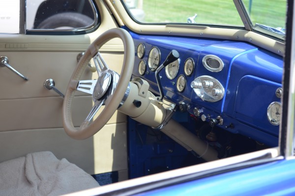 dash and steering wheel of a 1938 chevy hot rod coupe
