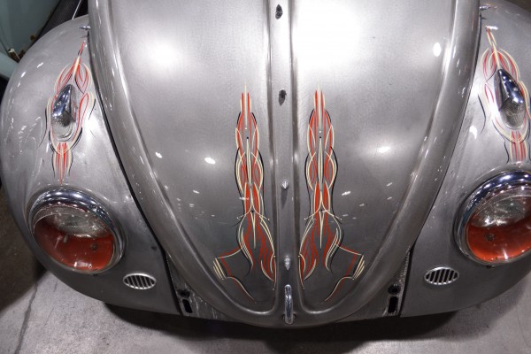 custom pinstriping on the front of a vintage Volkswagen beetle hood