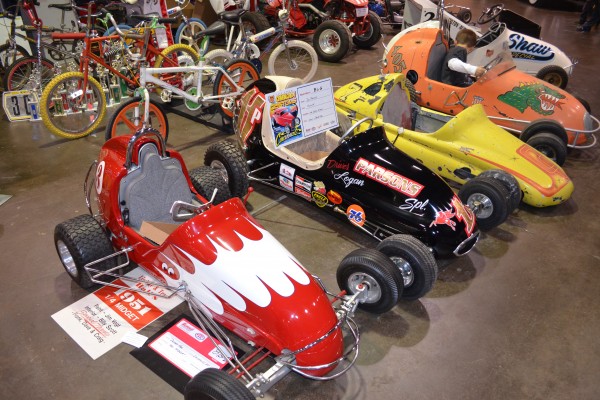 collection of vintage midget style pedal toy race cars