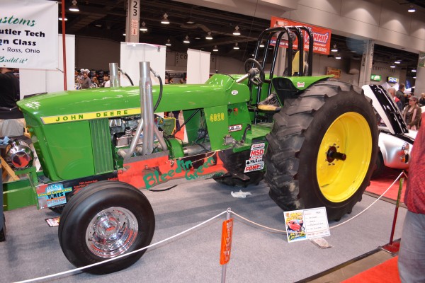 Vintage John Deere Tractor at indoor car show