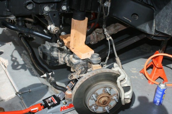 installing bump stop extensions in a jeep wrangler frame