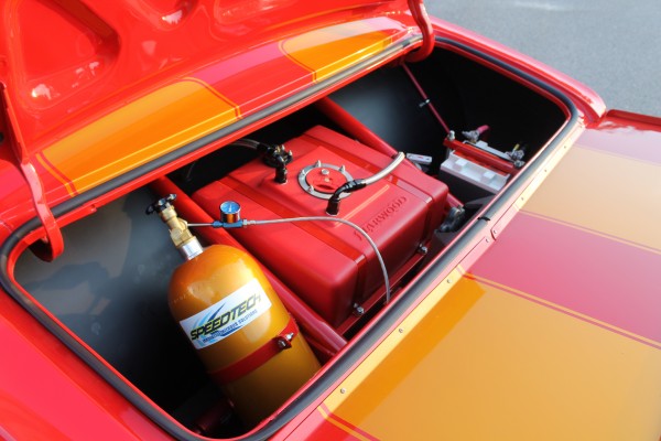 fuel cell and nitrous bottle in the back of a pro street 1967 chevy camaro drag car