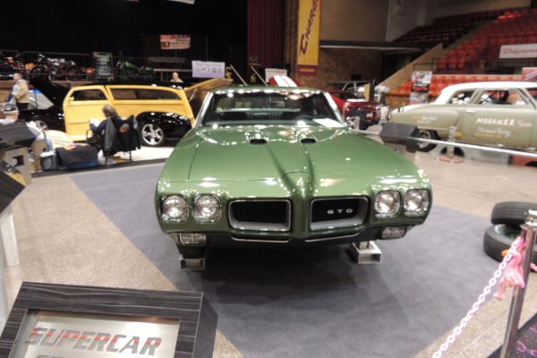 front end of a Pontiac second gen gto displayed at indoor car show