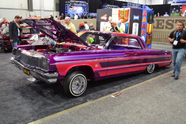 purple chevy impala lowrider with hydraulic suspension