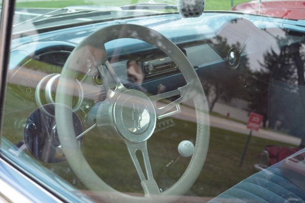 steering wheel and dash of a 1956 Chevy Sedan