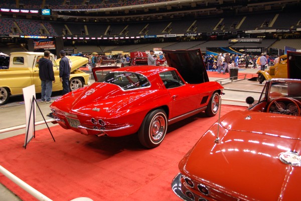 red 1967 chevy corvette sting ray coupe Displayed at Indoor Car Show