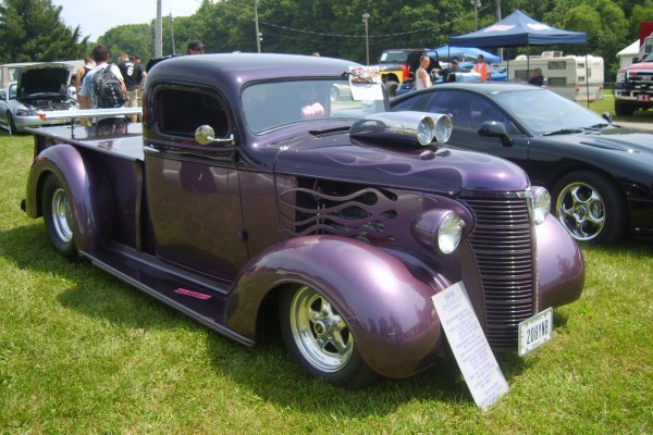 Classic hot rod pickup truck at a car show