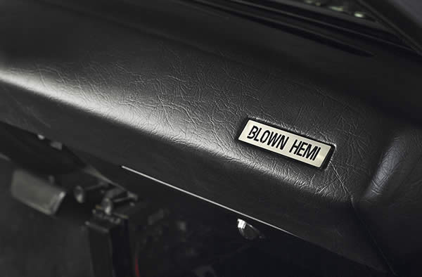 Blown hemi dash plaque in a custom barracuda muscle car