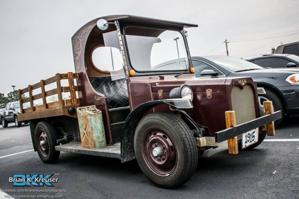 1915 huckster style truck with a wooden stake bed