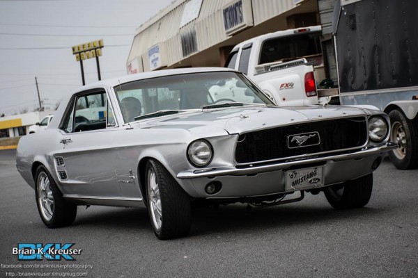 silver 1967 ford mustang notchback coupe