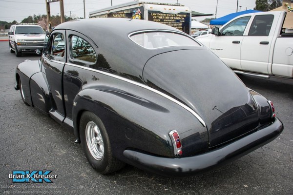 vintage black prewar hot rod, rear view