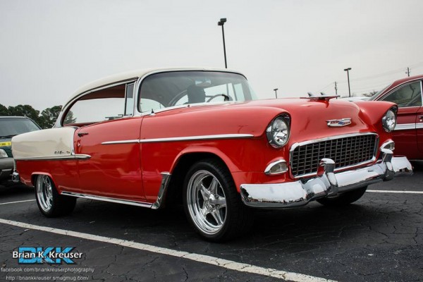 red and white 1955 chevy bel air with custom wheels