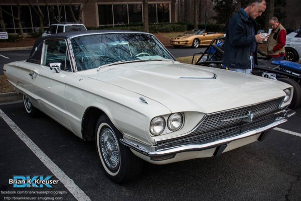 white ford thunderbird coupe at local cruise in car show