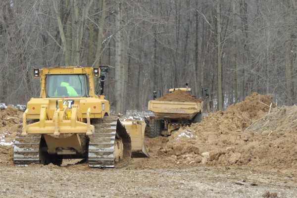 bulldozer and earth mover at a large construction site