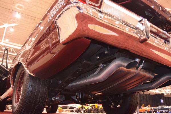 exhaust pipe and gas tank beneath a 1965 plymouth satellite