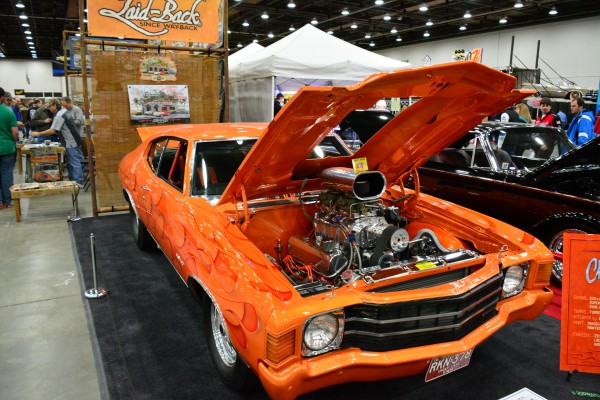 supercharged chevelle pro street on display at indoor car show