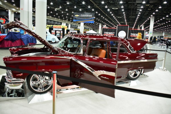 custom postwar coupe on display at indoor car show