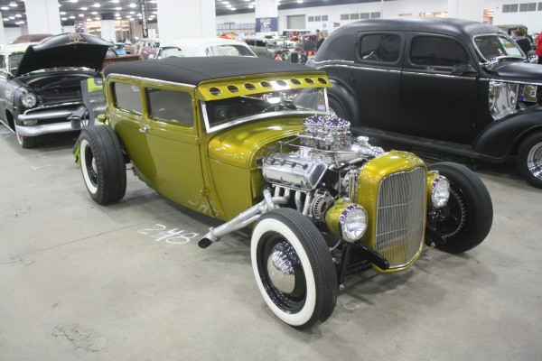 lowered green ford hotrod with hemi v8
