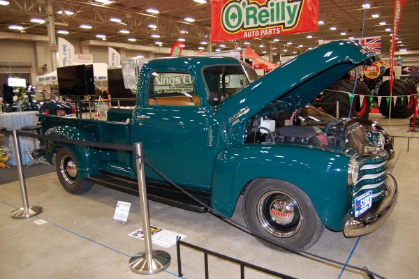 vintage chevy 3100 truck on display at indoor car show