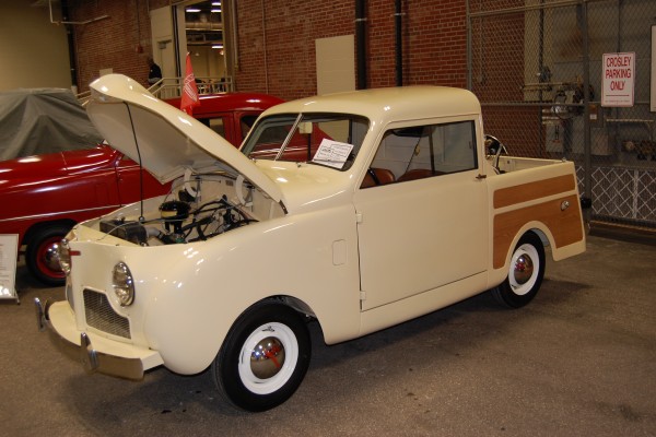 vintage crosley pickup truck on display at indoor car show