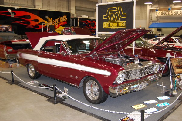 ford falcon sprint v8 convertible on display at indoor car show