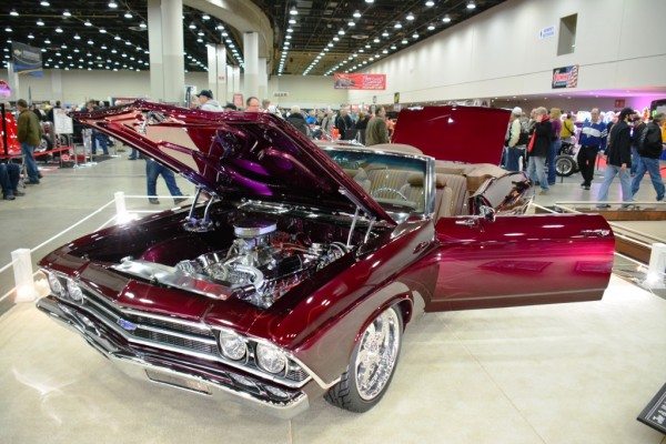custom chevy Chevelle convertible on display at indoor car show