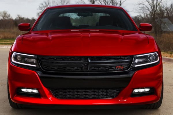 front grille of a red 2015 dodge charger sedan