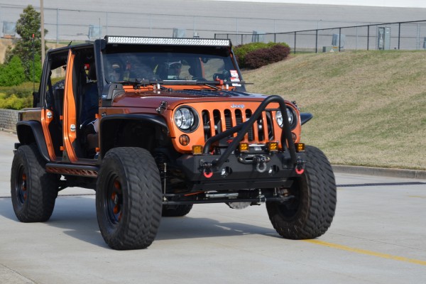 customized jeep wrangler jk with stinger bumper and doors removed