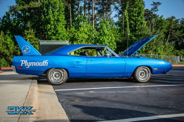 side view of a blue 1970 plymouth roadrunner superbird