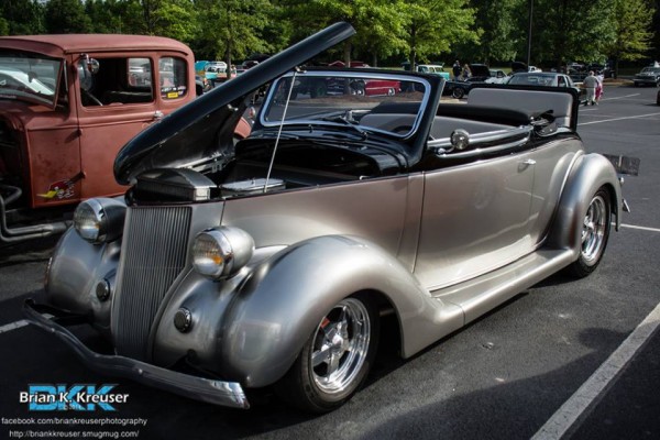 customized roadster hot rod coupe with a rumble seat