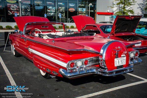 1960 Chevy Impala convertible coupe with fender skirts and continental tire kit