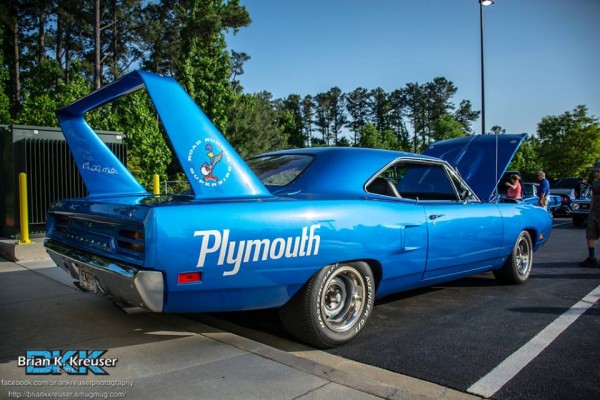 rear side view of a blue 1970 plymouth roadrunner superbird